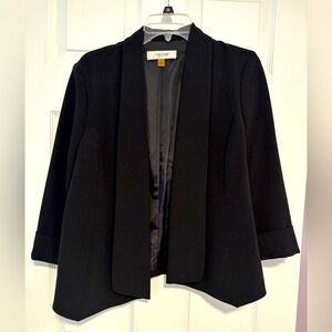 Black no button suit jacket, great to go with any dresss shirt